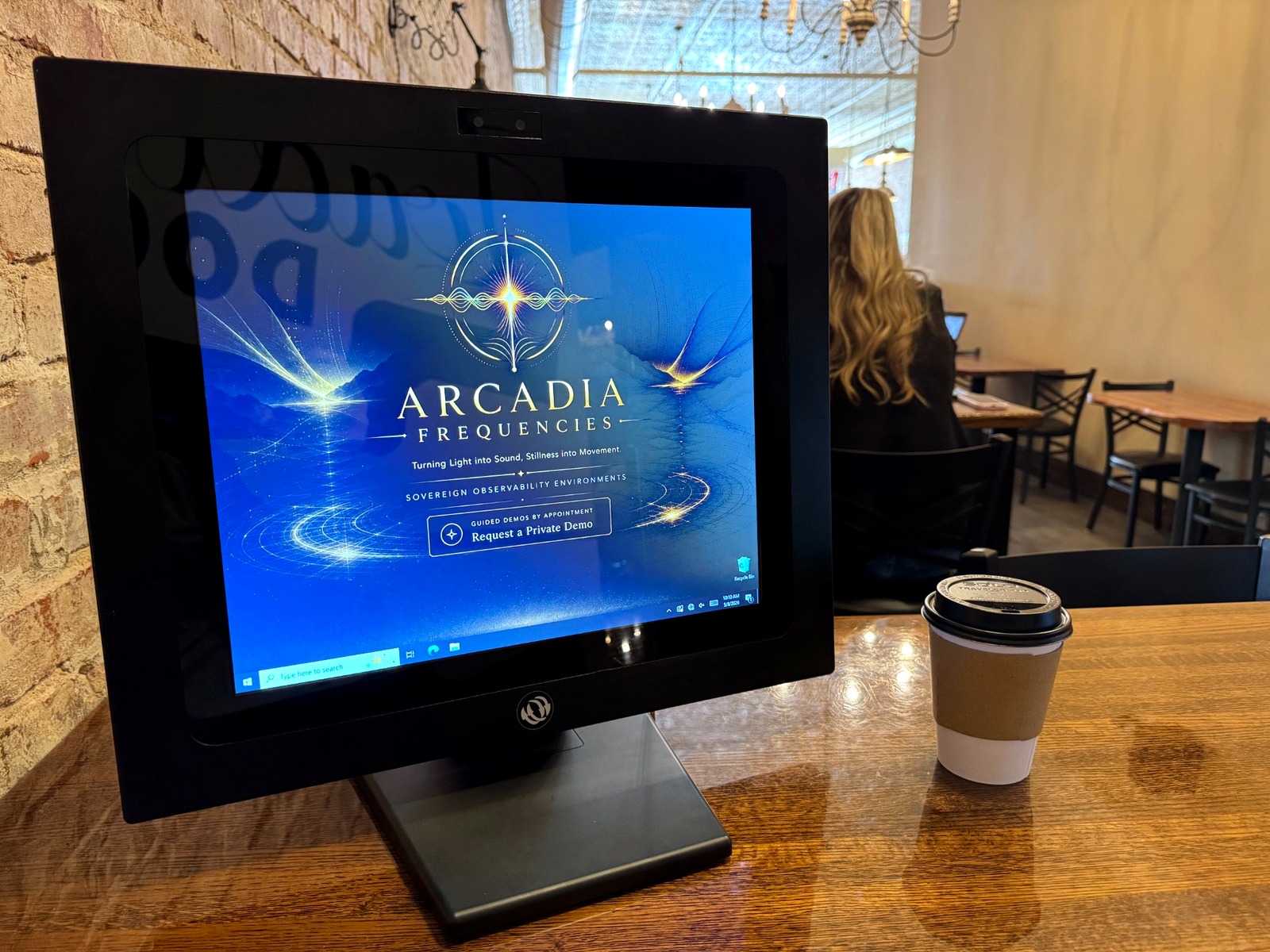 UNO Command Station by Arcadia Frequencies displayed in a warm coffee shop setting